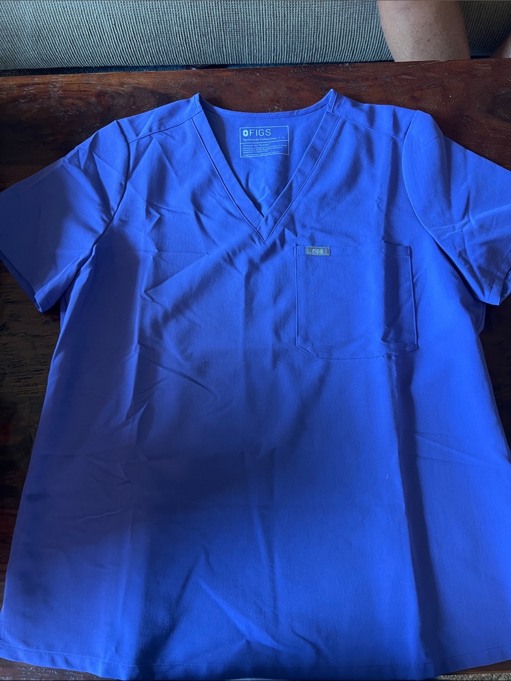 Women’s One pocket top Size Large